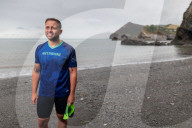 Iím here to help people Ö that gives me a superpowerí: one manís challenge to swim 10 Swiss lakes.