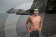 Iím here to help people Ö that gives me a superpowerí: one manís challenge to swim 10 Swiss lakes.