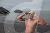Iím here to help people Ö that gives me a superpowerí: one manís challenge to swim 10 Swiss lakes.