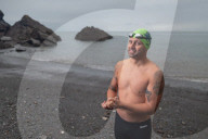 Iím here to help people Ö that gives me a superpowerí: one manís challenge to swim 10 Swiss lakes.
