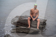 Iím here to help people Ö that gives me a superpowerí: one manís challenge to swim 10 Swiss lakes.