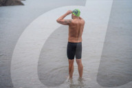 Iím here to help people Ö that gives me a superpowerí: one manís challenge to swim 10 Swiss lakes.