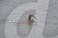 Iím here to help people Ö that gives me a superpowerí: one manís challenge to swim 10 Swiss lakes.