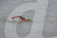 Iím here to help people Ö that gives me a superpowerí: one manís challenge to swim 10 Swiss lakes.