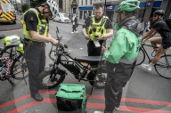 City of London police fine and confiscate illegal E bikes. 
