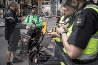 City of London police fine and confiscate illegal E bikes. 