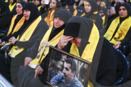 Hezbollah Supporters Listen To Naim Qassem's Speech In Beirut 