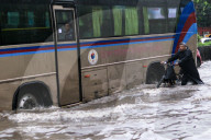 Dhaka Streets Submerged Following Monsoon Downpour