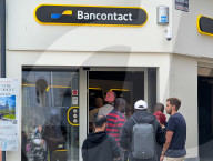 Bancontact ATM With People