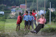 Nepali Celebrate Dashain Playing Swings