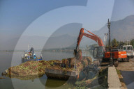 Cleaning Operation To Remove Weeds From Srinagar's Dal Lake