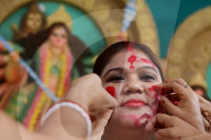 Bengali women play with Vermilion on last day of Durga Puja