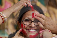 Bengali women play with Vermilion on last day of Durga Puja