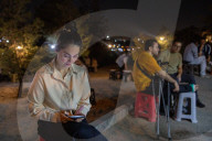 Tehranis, avid cell phone users