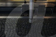 Man Sitting Alone On Bench At Night