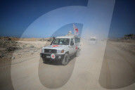 Gaza morgue workers recover bodies of Palestinians returned by Israel