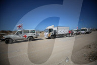 Gaza morgue workers recover bodies of Palestinians returned by Israel