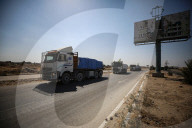 Trucks carrying food aid and fuel arive Gaza
