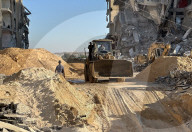 Gazans searching for bodies of Israeli hostages