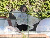 PREMIUM EXCLUSIVE: *PREMIUM-EXCLUSIVE* *MUST CALL FOR FEES*?It's Family Time for the American actress Anne Hathaway relaxing after filming 'The Devil Wears Prada 2' out in Portofino.