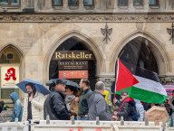 Man With Pro Palestine Protest Flag Accuses German Political Parties Of Supporting Genocide At Marienplatz