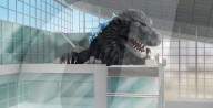Monster Godzilla welcome for airport visitors