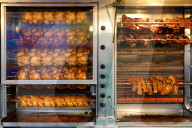 Customers At A Roast Chicken Food Stall In Munich Amidst Bird Flu Concerns