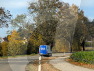 GLS Delivery Van Drives Through Autumnal Countryside