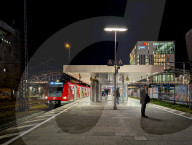 S-Bahn Train And PwC Building At Munich Hackerbruecke Station At Night