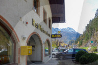 Raiffeisenbank Branch Against Snow-Capped Tyrolean Alps