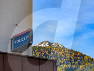 Austrian Police Signage And Alpine Mountain Landscape