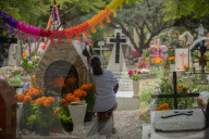 People Visit Cemeteries On The Day Of The Dead