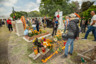 People Visit Cemeteries On The Day Of The Dead