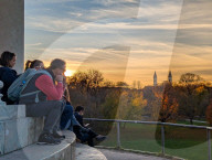 People View Munich's Iconic Skyline From The Monopteros At Sunset