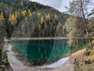 Lake Blindsee With Zugspitze Massif And Autumnal Forests In Tyrol