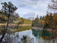 Lake Blindsee With Zugspitze Massif And Autumnal Forests In Tyrol
