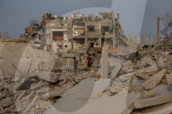 Palestinians returning to Jabalia buildings reduced to rubble