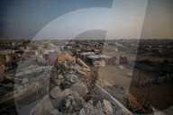 Palestinians returning to Jabalia buildings reduced to rubble