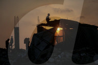 Palestinians returning to Jabalia buildings reduced to rubble