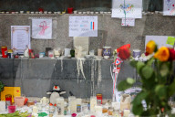 Flowers And Candles To Honor Victims Of 2015 Terrorist Attacks In Paris