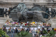 Flowers And Candles To Honor Victims Of 2015 Terrorist Attacks In Paris