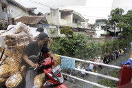 Residents And Volunteers Unite To Clean The River In Bandung 