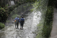 Residents And Volunteers Unite To Clean The River In Bandung 