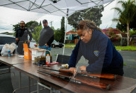 Oakland California hosts Guns to Gardens gun turn-in program