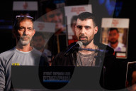 Former hostages address rally at Freed Square