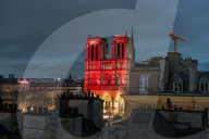 Notre Dame Lights Up In Red - Paris