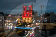 Notre Dame Lights Up In Red - Paris