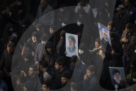 A Portrait Of Ayatollah Ali Khamenei At A Funeral For Unknown Iran-Iraq War Martyrs In Tehran 