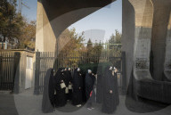 Veiled Iranian Women Participate In A Funeral For Unknown Martyrs