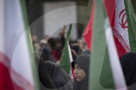 Veiled Iranian Women Participate In A Funeral For Unknown Martyrs